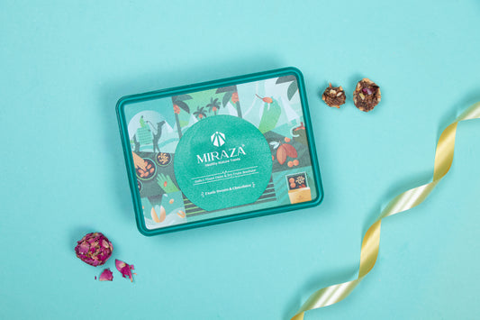 Miraza tea tin with decorative elements on a light blue background