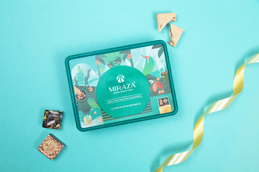 Miraza chocolate tin with decorative ribbon on a blue background