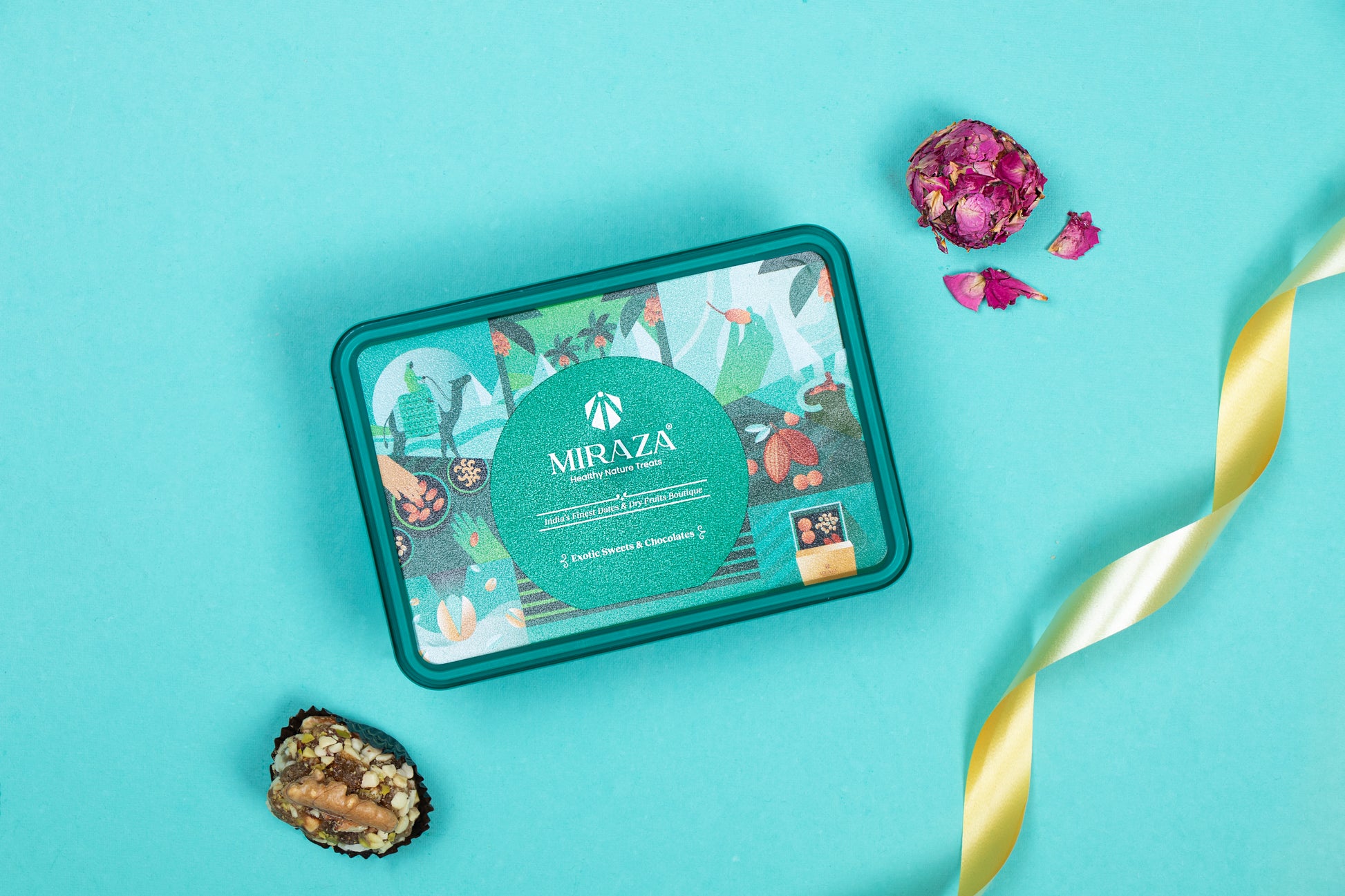 MIRZA tea packaging on a blue background with decorative elements
